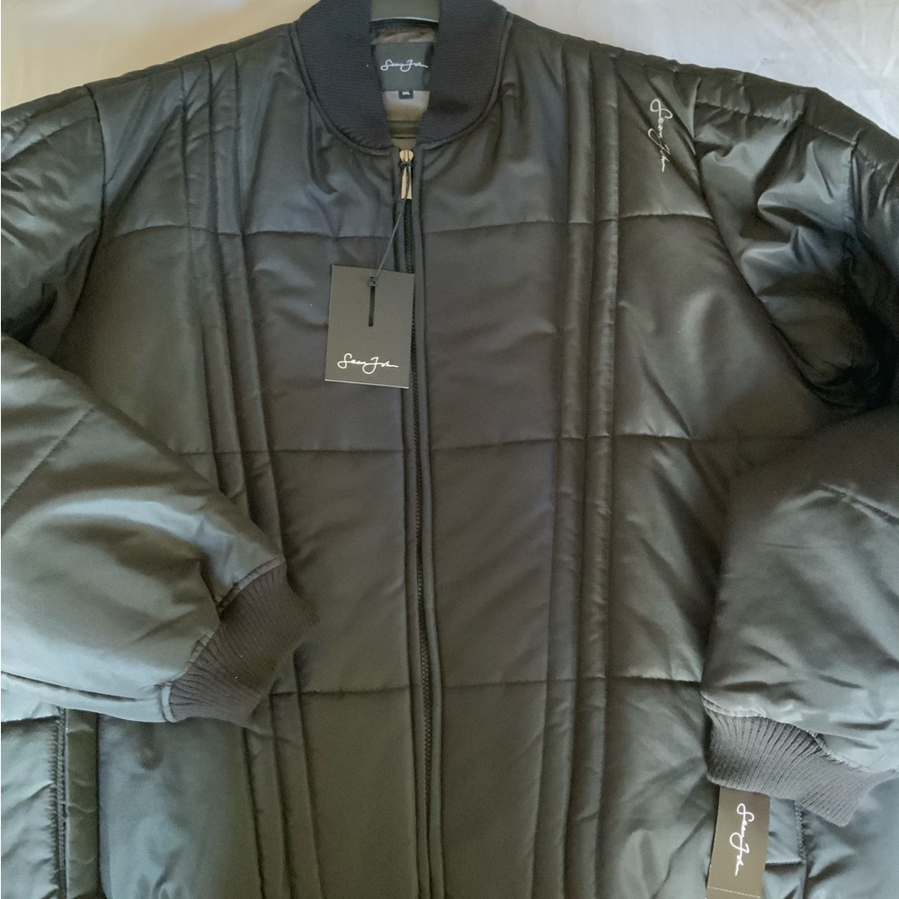 Lighter Puffer Ribbed collar sleeves and waist.